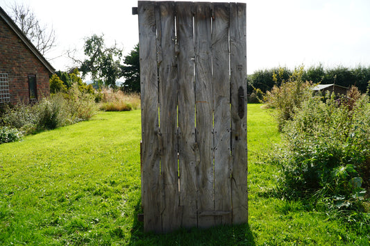 Rustic Reclaimed Wood Door with Vintage Metal Hardware