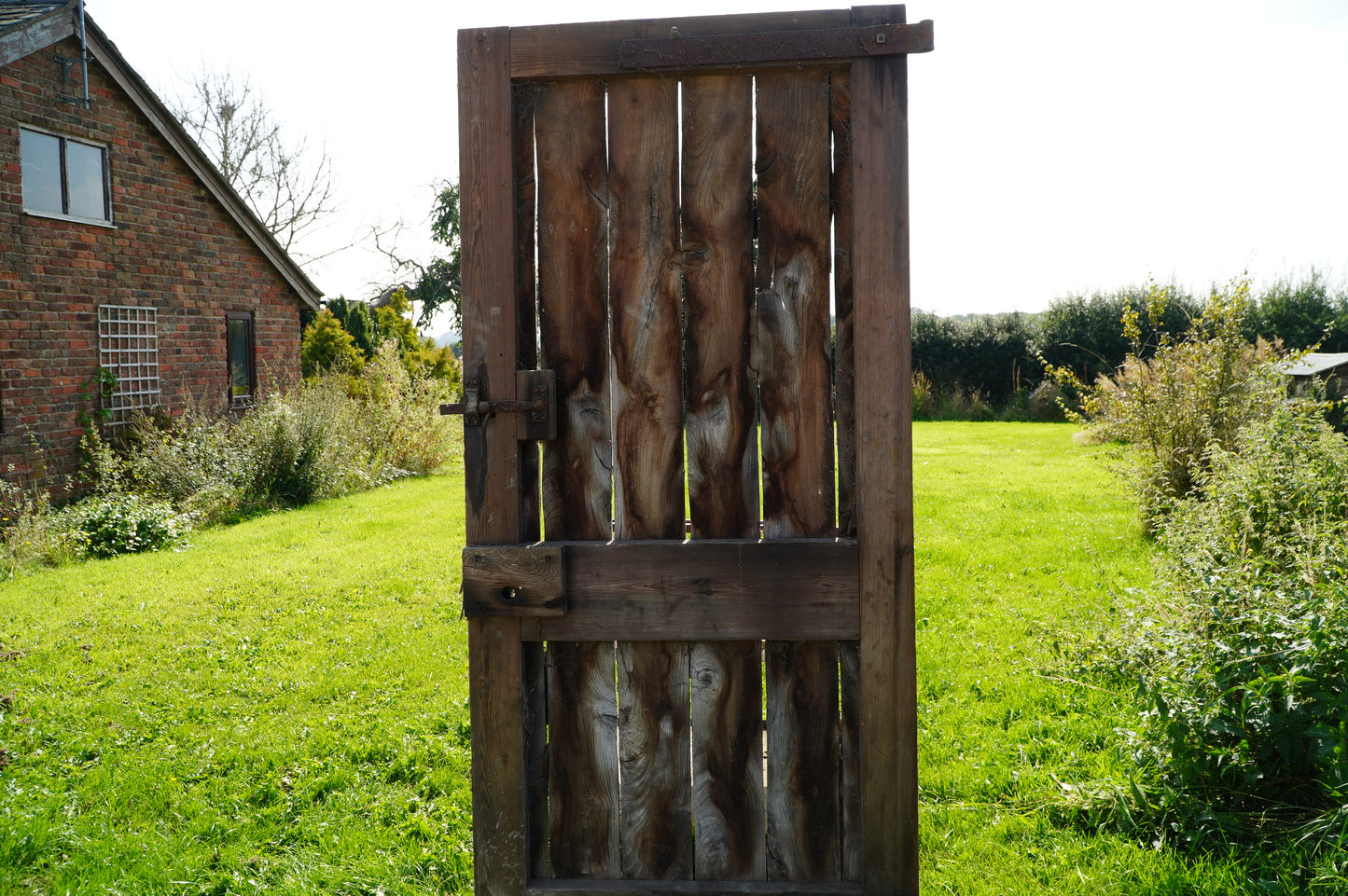 Rustic Reclaimed Wood Door with Vintage Metal Hardware