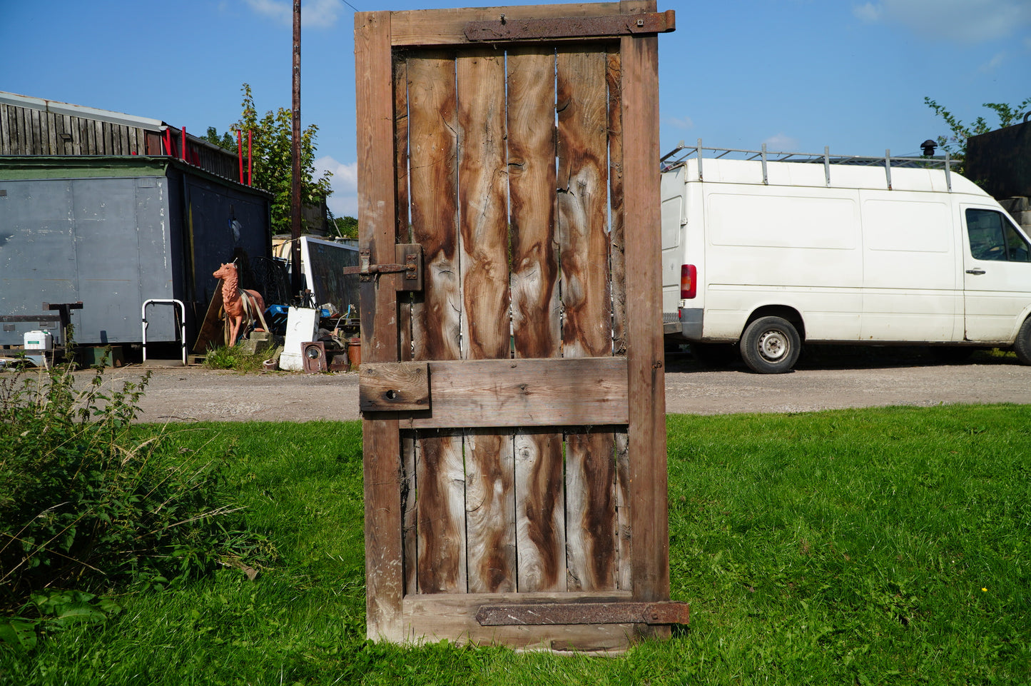 Rustic Reclaimed Wood Door with Vintage Metal Hardware