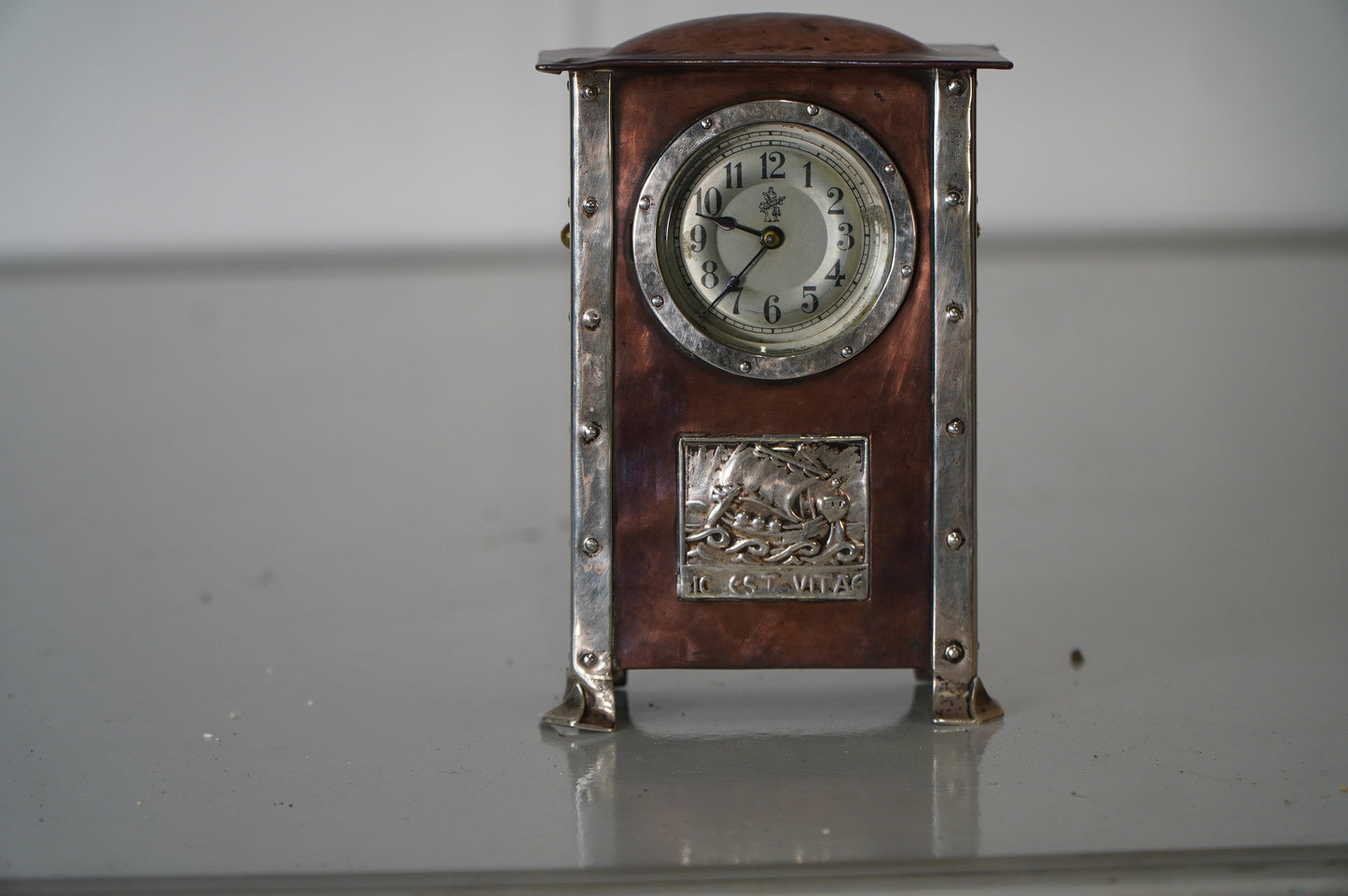 Copper and Silver Mantel Clock with Decorative Relief Panel - 1900's