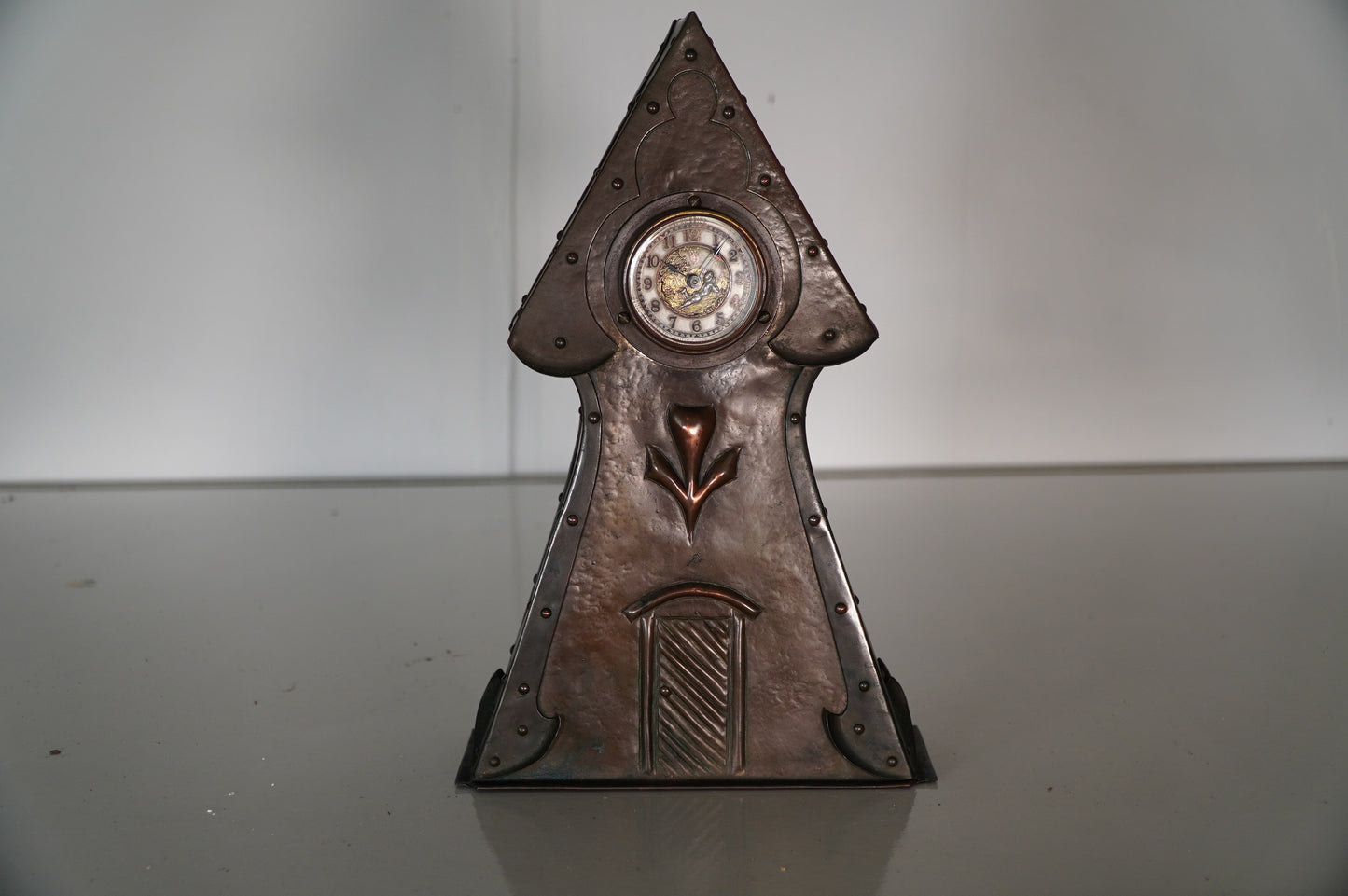 Antique Copper Triangular Mantel Clock with Engraved Decorative Face