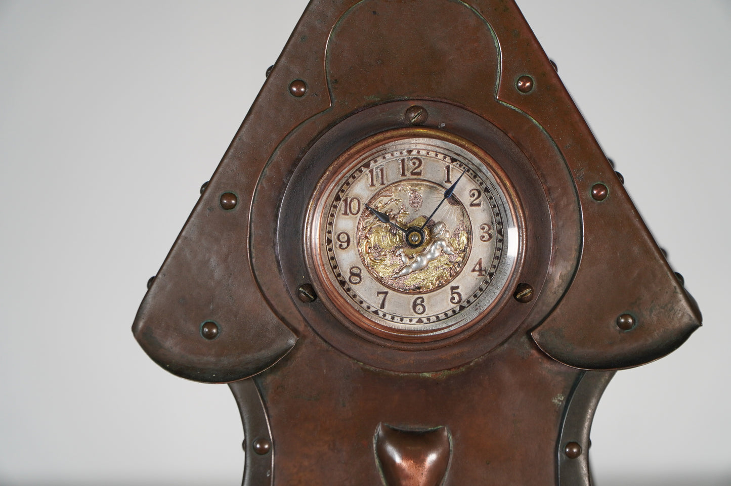 Antique Copper Triangular Mantel Clock with Engraved Decorative Face