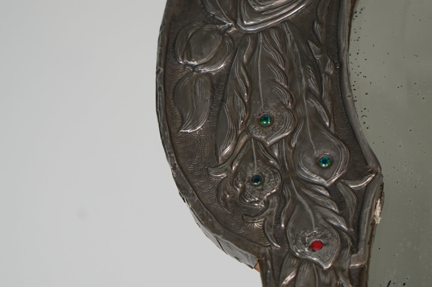 glasgow school Nouveau Mirror with Embossed Metal Frame and Peacock Feather Design